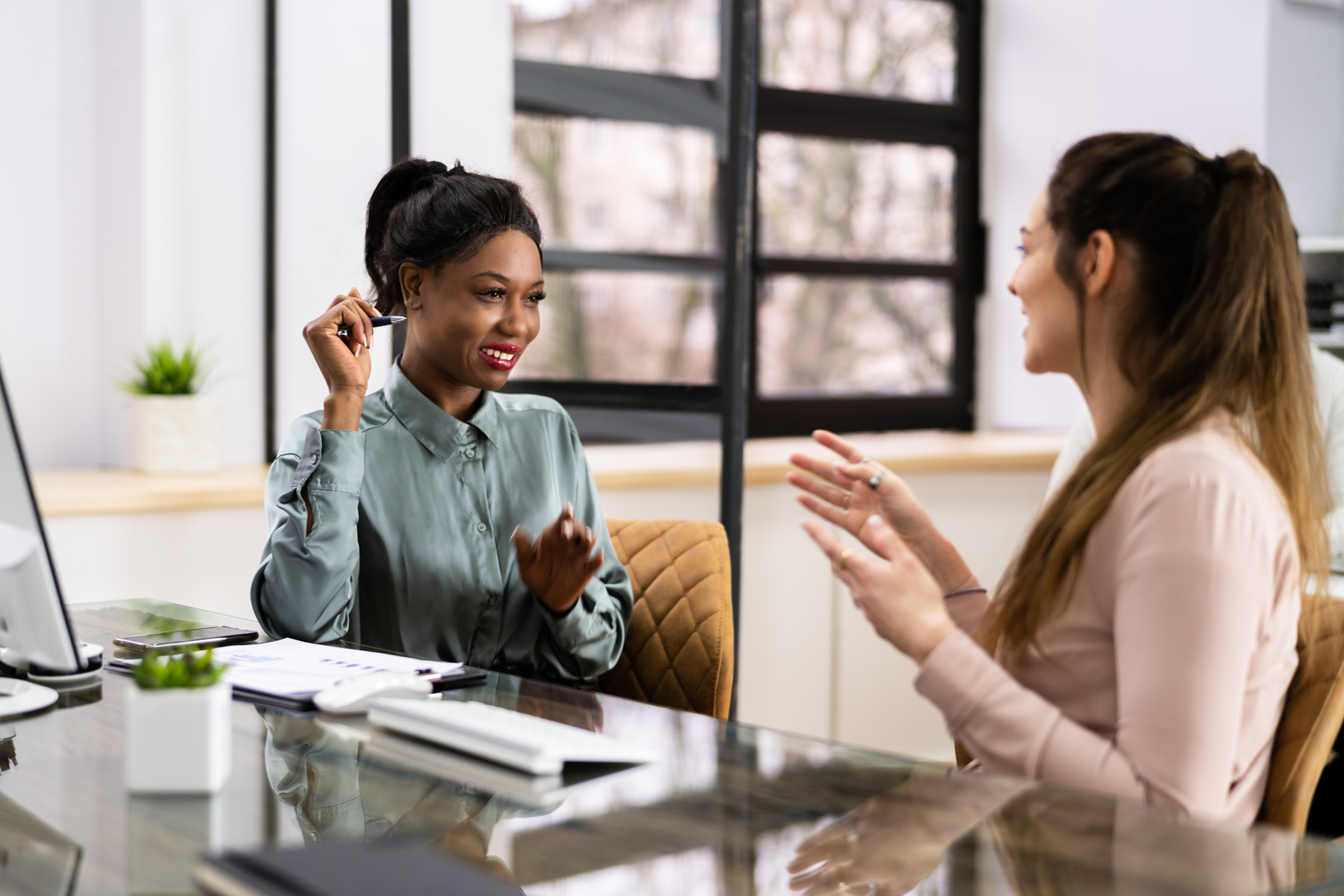 Two Business People Talking